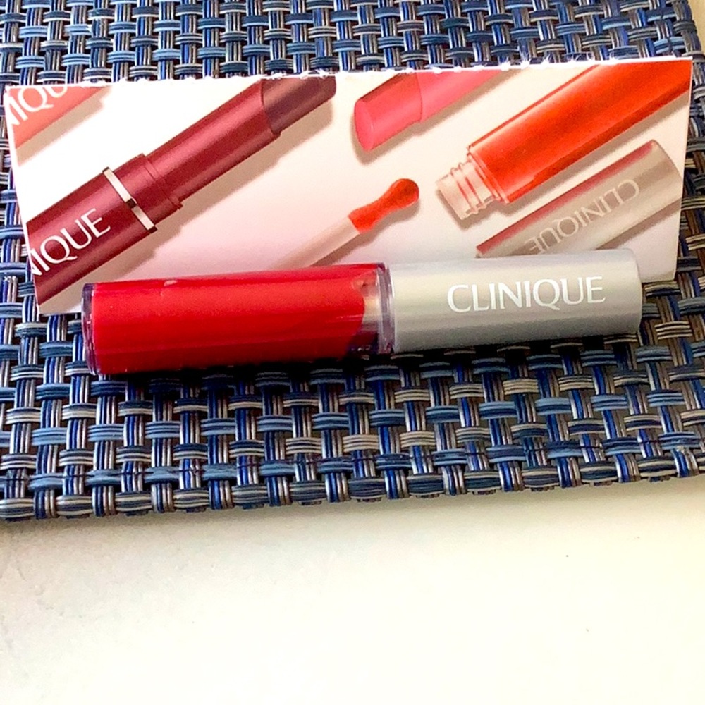Brand new Clinique juicy pop apple lip gloss .07 oz.
